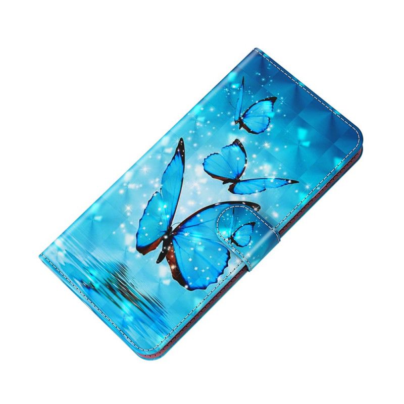 Flip Kotelot Moto E20 / E30 / E40 Flying Blue Butterflies Suojakuori