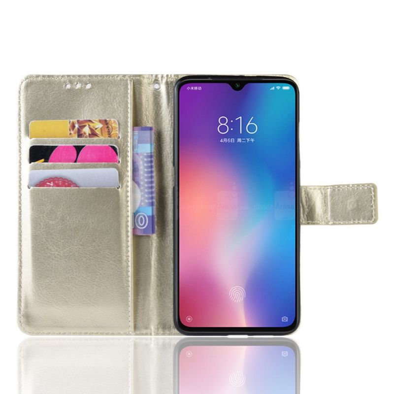 Kotelot Xiaomi Mi 9 Lite Kulta Musta Räikeä Tekonahka