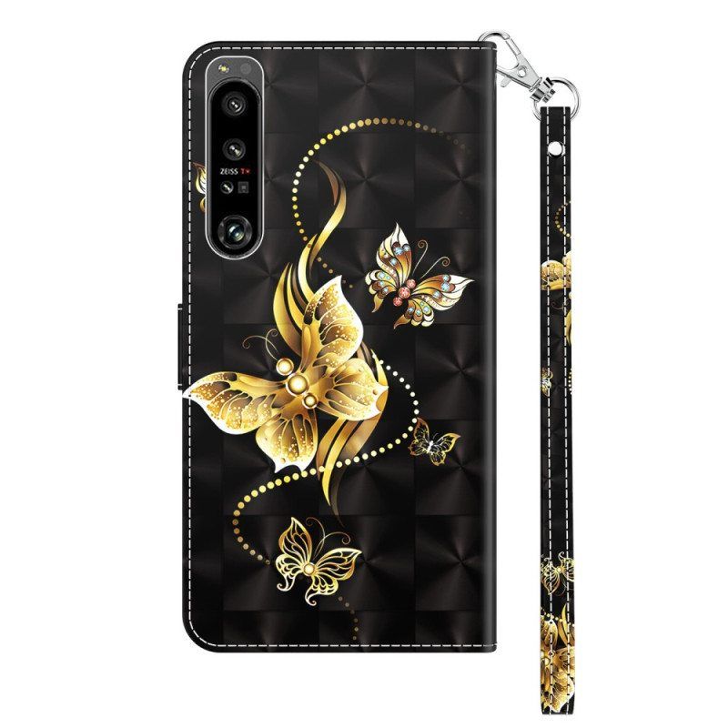 Flip Case Sony Xperia 1 IV Suojaketju Kuori Kultaiset Perhoset Hihnalla